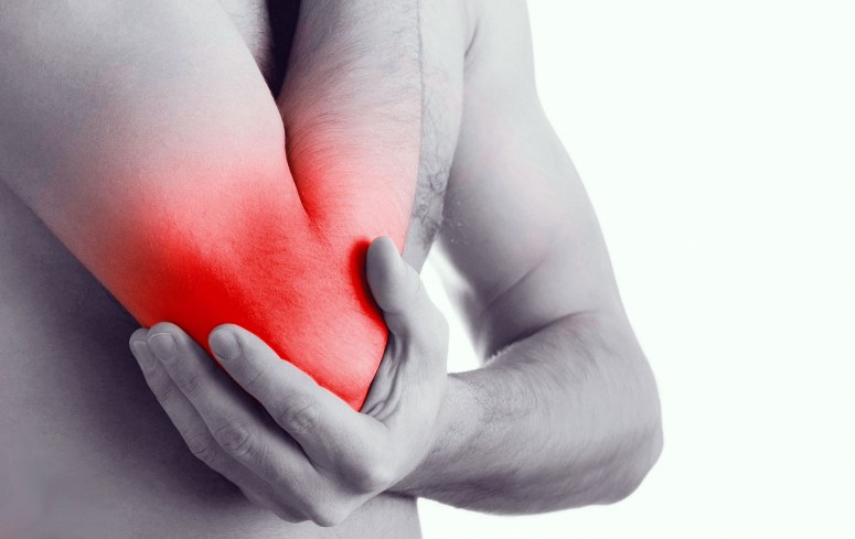 Почему может болеть локоть